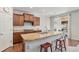 Modern kitchen featuring granite counters, ample cabinet space, and eat-in dining area at 2558 Northview Pl, Castle Rock, CO 80104