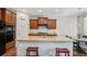Modern kitchen featuring granite counters, ample cabinet space, and eat-in dining area at 2558 Northview Pl, Castle Rock, CO 80104
