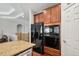 A kitchen view with stainless steel appliances, granite countertops and wood cabinets at 2558 Northview Pl, Castle Rock, CO 80104