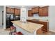 Eat-in kitchen featuring granite counters, ample cabinet space, and stainless steel appliances at 2558 Northview Pl, Castle Rock, CO 80104
