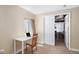 Office space featuring a desk, chair, and storage area, with a window providing natural light at 2558 Northview Pl, Castle Rock, CO 80104