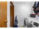 Laundry room with side-by-side washer and dryer and easy access to the main living area at 111 S Perry St, Denver, CO 80219