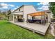 Outdoor deck with grill, seating, and covered gazebo at 6712 S Leyden Ct, Centennial, CO 80112