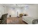 Basement room featuring carpet, a bed, electric guitar and natural light from windows at 6712 S Leyden Ct, Centennial, CO 80112