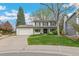 Well-maintained two-story house with a large front yard and a two car garage at 6712 S Leyden Ct, Centennial, CO 80112