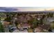 Aerial view of suburban neighborhood featuring single Gathering homes and mature trees at 6508 E Euclid Pl, Centennial, CO 80111
