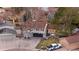 Aerial view of home with well-manicured lawn and mature trees in quiet neighborhood at 6508 E Euclid Pl, Centennial, CO 80111