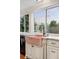 Close up of Kitchen with granite countertops and a unique farmhouse copper sink with scenic view at 6508 E Euclid Pl, Centennial, CO 80111