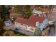 Back of home featuring a neutral-colored exterior, large windows, a patio, and a spacious backyard at 6508 E Euclid Pl, Centennial, CO 80111