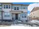 Charming two-story home with a covered front porch, light-colored siding, and a well-maintained lawn at 14106 Red Cosmos St, Parker, CO 80134