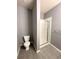Bathroom with toilet and shower stall at 8338 S Independence Cir # 104, Littleton, CO 80128