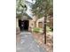 Inviting condo exterior featuring stone accents and well-maintained landscaping at 8338 S Independence Cir # 104, Littleton, CO 80128