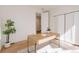 Bright bedroom with a minimalist desk, and ample closet space at 2530 Chase, Edgewater, CO 80215