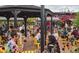 Outdoor dining area at a restaurant with ample seating and a vibrant, lively atmosphere at 2530 Chase, Edgewater, CO 80215