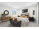 Beautifully staged bedroom with neutral colors, offering a calming and inviting retreat at 8893 Springsong Ln, Littleton, CO 80125