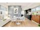 Dining area with an open floor plan connected to the modern kitchen at 3435 Lawrence St, Denver, CO 80205