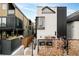 Modern home exterior featuring clean lines and a well-manicured landscape at 3435 Lawrence St, Denver, CO 80205