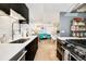 Modern kitchen with stainless steel sink and bright lighting at 3435 Lawrence St, Denver, CO 80205