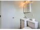 Bathroom showcasing the toilet and vanity at 1785 S Zuni St, Denver, CO 80223