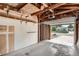 Spacious garage interior with ample storage and an automatic door opener at 1785 S Zuni St, Denver, CO 80223