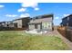 Spacious backyard with a patio, great for entertaining guests and enjoying outdoor living at 24784 E Tennessee Pl, Aurora, CO 80018