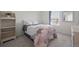 Cozy bedroom features a comfortable bed with decorative pillows and a stylish quilt at 24784 E Tennessee Pl, Aurora, CO 80018