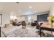 Spacious finished basement with carpet, recessed lighting, and versatile layout for entertaining at 2700 W Greens Pl, Littleton, CO 80123