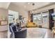Stylish living room with large windows, comfortable seating, and elegant hardwood floors, creating an inviting atmosphere at 2700 W Greens Pl, Littleton, CO 80123