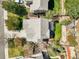 A beautiful aerial view of a home with well-maintained landscaping, a cozy pergola, and a charming outdoor seating area at 3928 Miners Candle Dr, Castle Rock, CO 80109