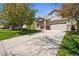 Lovely two-story home featuring a spacious driveway, attached garage, and manicured front lawn at 3928 Miners Candle Dr, Castle Rock, CO 80109