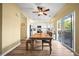 Spacious kitchen with an adjacent dining area featuring a wooden table and sliding glass door at 3928 Miners Candle Dr, Castle Rock, CO 80109
