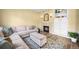 Inviting living room features a cozy fireplace, built-in shelving, and stylish decor at 3928 Miners Candle Dr, Castle Rock, CO 80109