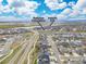 Aerial view of 12846 Palisade St, near The Cove at Barefoot Lakes and Peninsula Park at 12846 Palisade St, Mead, CO 80504