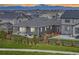 The property showcases a fenced backyard with a covered patio, perfect for outdoor relaxation and mountain views at 12846 Palisade St, Mead, CO 80504
