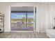 Covered patio perfect for outdoor dining, featuring views of the lush backyard at 12846 Palisade St, Mead, CO 80504