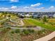 Scenic view of Barefoot Lakes community park with walking paths and landscaping at 12846 Palisade St, Mead, CO 80504