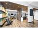 Beautiful lounge area with modern decor, wood accents, and plants at 12846 Palisade St, Mead, CO 80504
