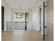 Bright hallway with natural light, modern railing and views to the neighborhood at 8015 Parnassus Pl, Castle Rock, CO 80108