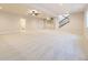 Expansive basement with carpet, stairway, bathroom, and recessed lights, ready for customization at 8926 S Rome Ct, Aurora, CO 80016