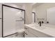 Bathroom featuring black fixtures, white subway tile, a shower and toilet with flooring at 8926 S Rome Ct, Aurora, CO 80016