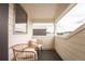 Relaxing balcony with comfortable seating and a view of the neighborhood; great for outdoor enjoyment at 6892 Juniper Ct, Arvada, CO 80007