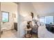 Sunlit main bedroom with an en-suite bathroom at 6892 Juniper Ct, Arvada, CO 80007