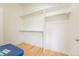 Spacious walk-in closet with built-in shelving and ample storage space at 6892 Juniper Ct, Arvada, CO 80007
