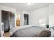 Cozy bedroom with built-in closet and access to upper level at 7995 E Mississippi Ave # J1, Denver, CO 80247