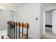 Hallway with doors to bedrooms and bathroom at 7995 E Mississippi Ave # J1, Denver, CO 80247