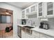 Updated kitchen with stainless steel appliances and white cabinets at 7995 E Mississippi Ave # J1, Denver, CO 80247