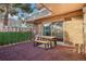 Small patio with a table and chairs, perfect for relaxing at 7995 E Mississippi Ave # J1, Denver, CO 80247