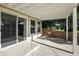 Covered patio features concrete flooring with adjacent yard views at 10601 Chadsworth Ln, Highlands Ranch, CO 80126