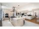 Modern kitchen with stainless steel appliances, light wood cabinets, and white countertops at 2674 S Krameria St, Denver, CO 80222