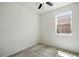 Cozy bedroom with neutral walls, carpet and natural light through a window at 1881 S Dunkirk St # 106, Aurora, CO 80017
